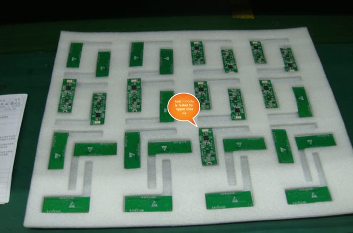 PVT production: tested touch module pcba for top cover chassis mount